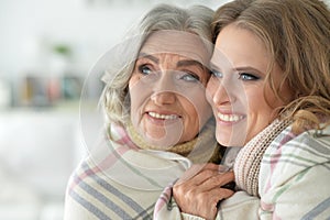 Beautiful elderly mother with an adult daughter