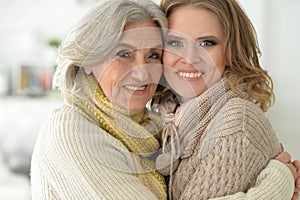 Beautiful elderly mother with an adult daughter