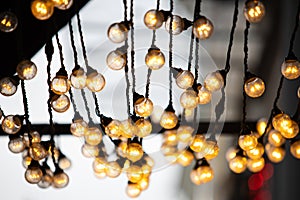 beautiful electric golden garland with lights with blur