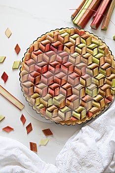 Beautiful elegant and delicious Rhubarb - Strawberry geometric pie against white background