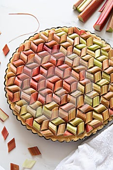 Beautiful elegant and delicious Rhubarb - Strawberry geometric pie against white background