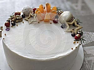 Beautiful and elegant grey cake decorated with melted