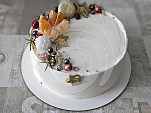 Beautiful and elegant grey cake decorated with melted