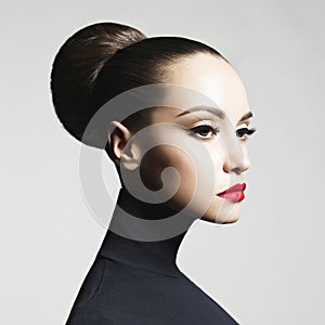 Beautiful elegant woman in black turtleneck