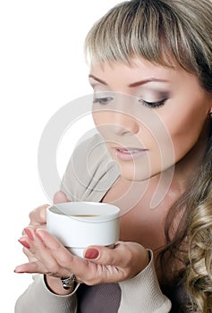Beautiful elegant woman with a coffee cup