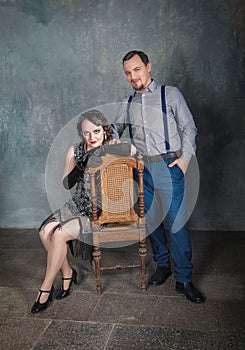 Beautiful elegant woman and handsome man in retro 20 â€“ 30 style