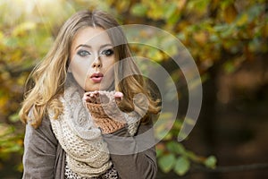 Beautiful elegant woman in a park