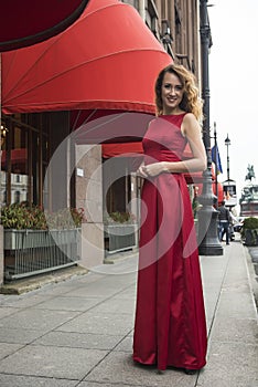 Beautiful elegant woman in a red dress