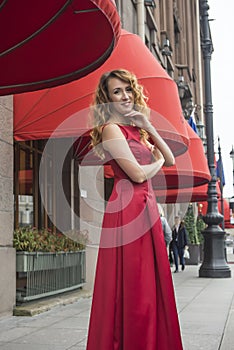 Beautiful elegant woman in a red dress