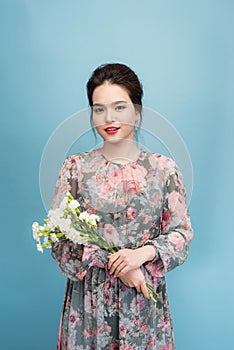 Beautiful elegant woman wearing flower dress