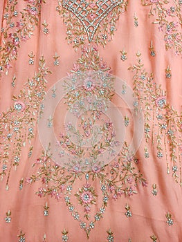 Beautiful embroidered pattern of zardozi embroidery on bridal dress