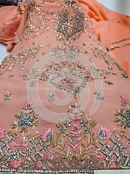 Beautiful embroidered pattern of zardozi embroidery on bridal dress