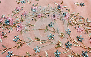 Beautiful embroidered pattern of zardozi embroidery on bridal dress