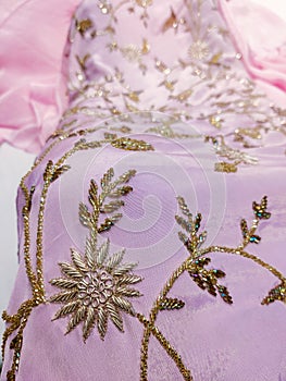 Beautiful embroidered pattern of zardozi embroidery on bridal dress
