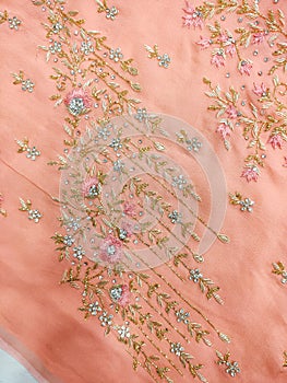 Beautiful embroidered pattern of zardozi embroidery on bridal dress