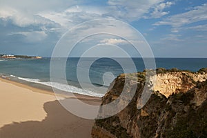 Beautiful empty beach Praia da Rocha in spring. Algarve region, Portugal