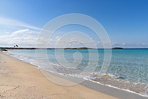 beautiful empty golden sand beach at the Platja de Ses Illetes isthmus on Formentera island