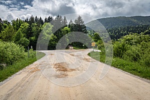 Beautiful empty macadam road with crossroads, in cerknica, Slovenia photo