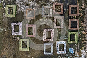 Beautiful empty picture frames hanging on the old wall on a street in Stone Town of Zanzibar Island, Tanzania, Africa, close up