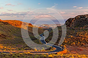 Beautiful empty road through the canyon to the Atlantic ocean on the island of Gran Canaria