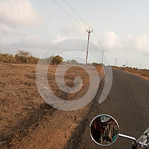 Beautiful empty silent narrow road of village of kokan in india