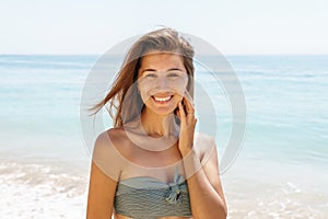 Beautiful Engaged Young Woman Portrait With Engagement Diamond Ring Feeling Happy On Beach