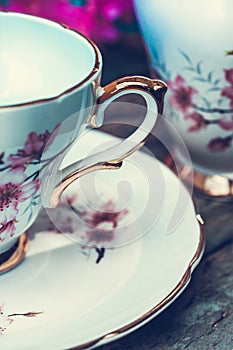 Beautiful, English, vintage teacup with Japanese cherry tree blossoms, close up