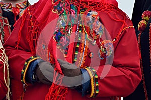 Beautiful ethnic hutsul woman`s red jacket with ornamental embroidery and beautiful decoration made from wool ,Carpathians mountai