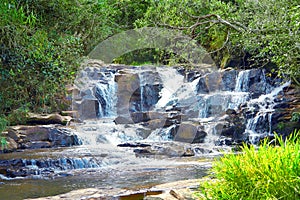 Beautiful Eubiose waterfall in the forest, SÃ£o ThomÃ© das Letras, Brasil. photo