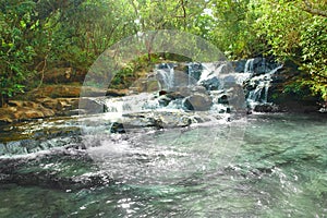 Beautiful Eubiose waterfall in the forest, SÃ£o ThomÃ© das Letras, Brasil. photo