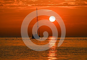 Beautiful evening Adriatic sea, yacht and sunset sky, Croatia. Evening seascape.