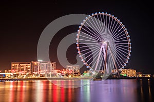 Beautiful evening landscape with Dubai eye on the Jumeirah beach