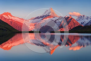 Beautiful evening panorama from Bachalp lake / Bachalpsee, Switzerland. Picturesque summer sunset in swiss Alps , Grindelwald.