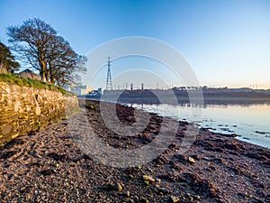 Beautiful evening on the river bank of the River Foyle at Culmore Point, Derry, Londonderry - Northern Ireland