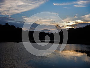 Beautiful evening sky, beautiful clouds and reflection in the water