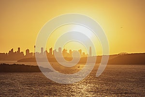 Beautiful evening sunset shot of the Sydney Harbour with the Sydney skyline in the background, seen from Fairfax Lookout