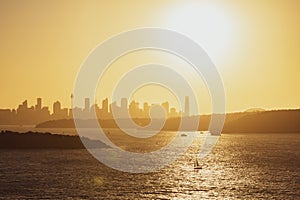 Beautiful evening sunset shot of the Sydney Harbour with the Sydney skyline in the background, seen from Fairfax Lookout