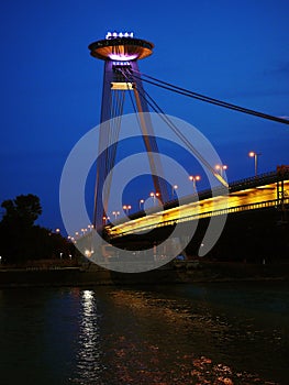 A beautiful evening view of Bratislava, the Danube River and an interesting SNP bridge with a UFO-style restaurant at the top