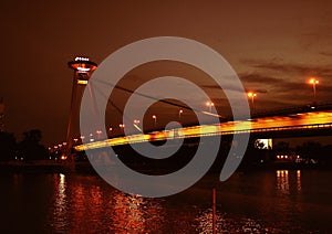 A beautiful evening view of Bratislava, the Danube River and an interesting SNP bridge with a UFO-style restaurant at the top