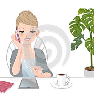 Beautiful executive woman talking on the phone with touch pad