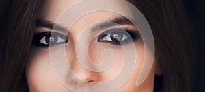 Beautiful eyes with bright makeup. view, sensual look. Female eyes with long eyelashes. Smoky eye makeup. Eyeshadows. Perfect