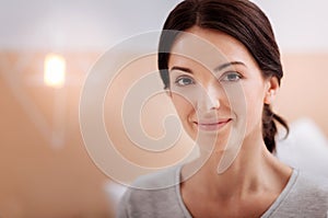 Beautiful face of a calm smiling woman