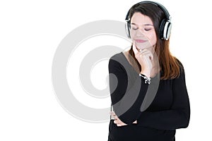 Beautiful face girl listening music in headphones over white background and copy space