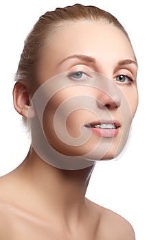 Beautiful face of young woman with clean fresh skin