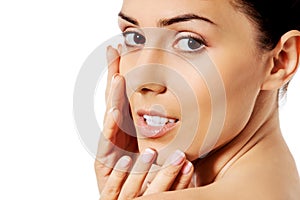 Beautiful face of young woman with clean fresh skin.