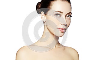 Beautiful face of young woman. Skincare, wellness, spa. Clean soft skin, healthy fresh look. Natural daily makeup