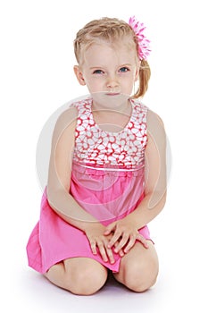 Beautiful fair-haired white-skinned little girl in