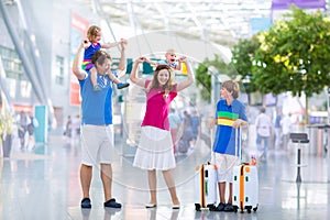 Beautiful family at the airport photo