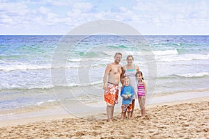 Beautiful Family enjoying a day at the beach