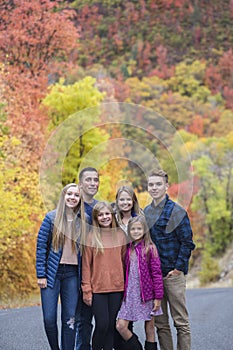 Beautiful Family Portrait with fall colors in the background
